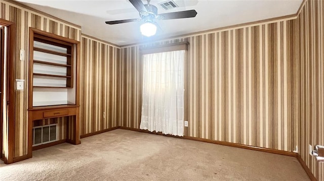 3731 Newport St, Oklahoma City, OK 73112 - empty room featuring wallpapered walls, visible vents, carpet floors, and a ceiling fan