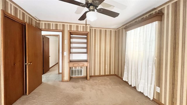 3731 Newport St, Oklahoma City, OK 73112 - empty room featuring visible vents, ceiling fan, wallpapered walls, and light carpet