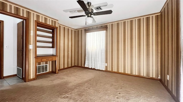 3731 Newport St, Oklahoma City, OK 73112 - carpeted spare room with visible vents, ceiling fan, and wallpapered walls
