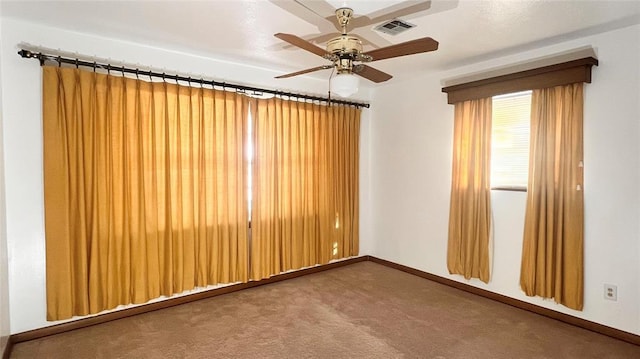 3731 Newport St, Oklahoma City, OK 73112 - empty room featuring carpet flooring, a ceiling fan, baseboards, and visible vents