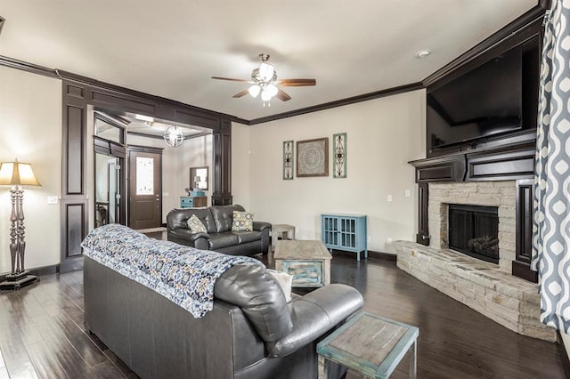 2241 W Mickey Dr, Mustang, OK 73064 - living area featuring ornamental molding, baseboards, a ceiling fan, and dark wood-type flooring