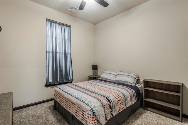 2241 W Mickey Dr, Mustang, OK 73064 - carpeted bedroom with baseboards, a ceiling fan, and visible vents