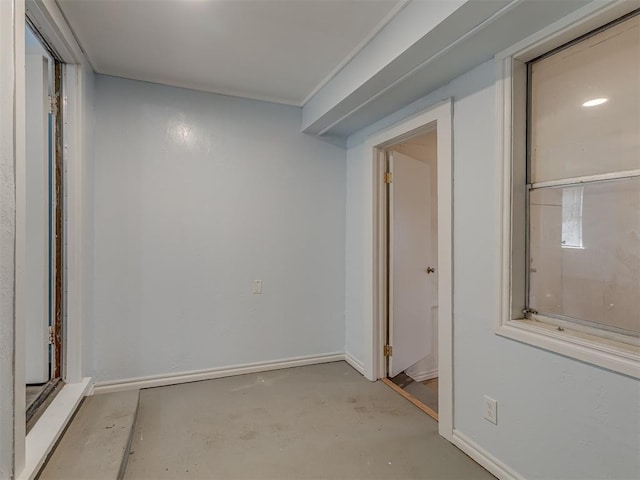 empty room with baseboards