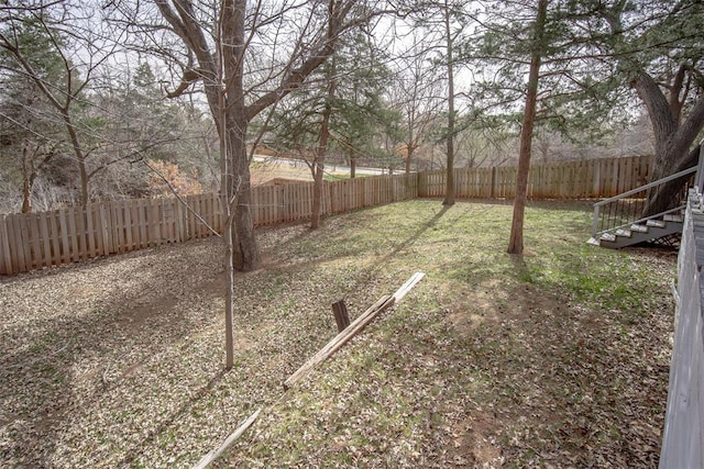 view of yard featuring a fenced backyard