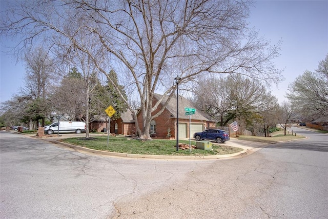 view of street featuring curbs and traffic signs