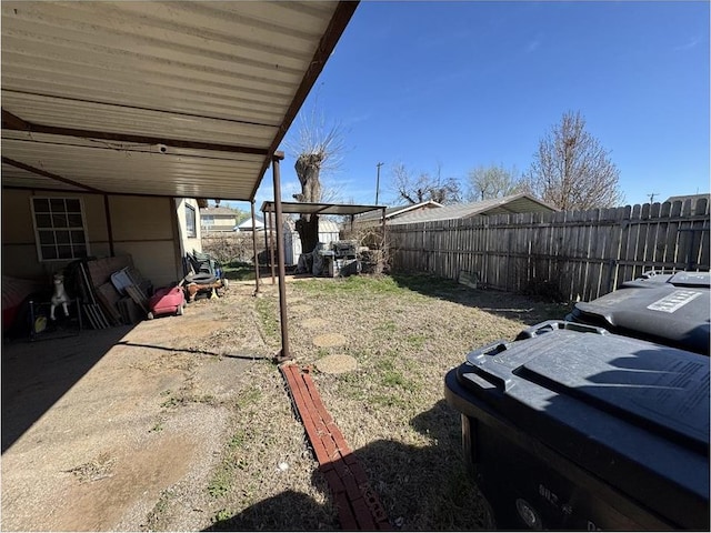 501 SE 15th St, Oklahoma City, OK 73129 - view of yard with a hot tub and a fenced backyard