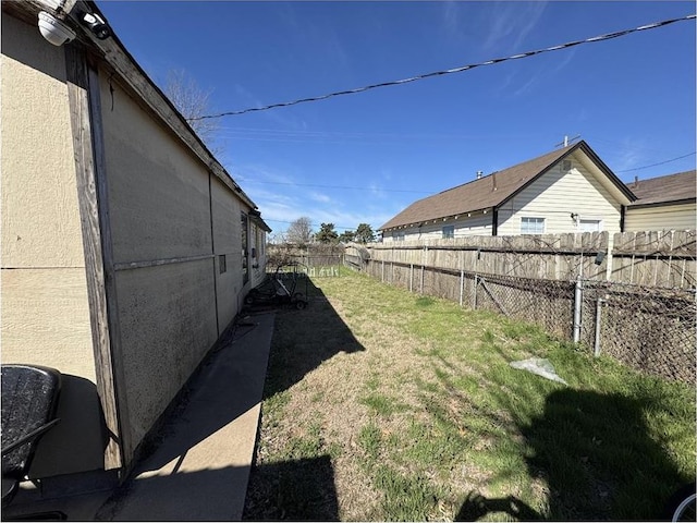 501 SE 15th St, Oklahoma City, OK 73129 - view of yard with a fenced backyard