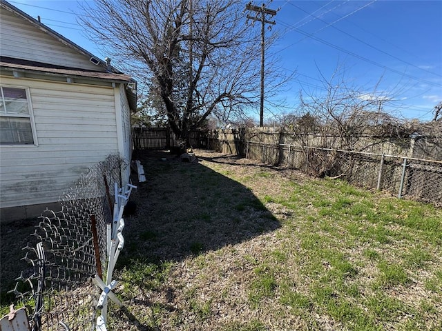 501 SE 15th St, Oklahoma City, OK 73129 - view of yard featuring a fenced backyard