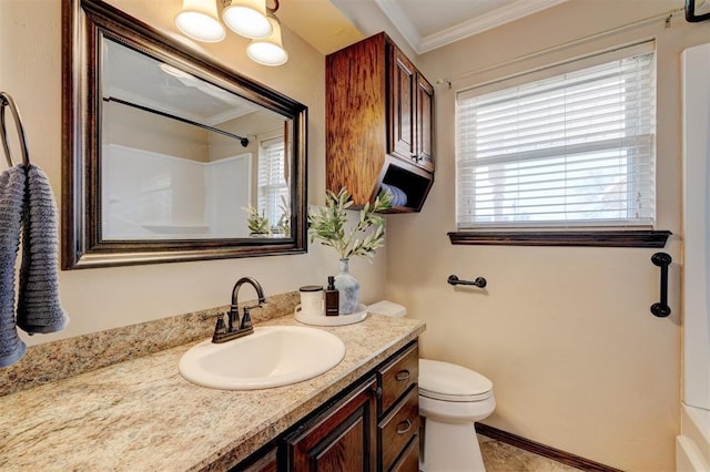 bathroom featuring vanity, baseboards, ornamental molding, walk in shower, and toilet