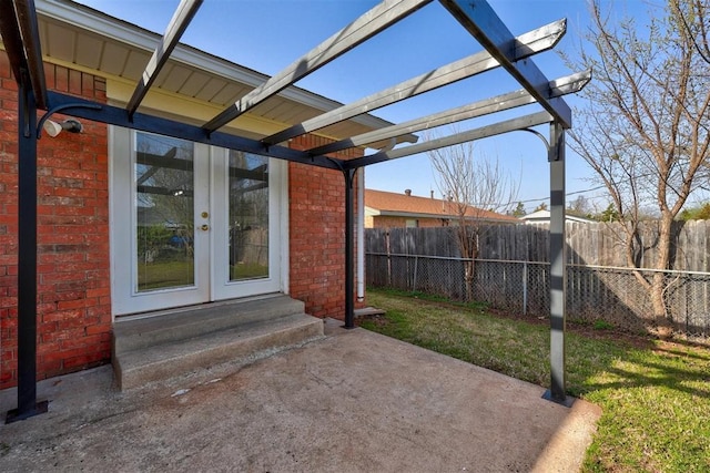 view of patio / terrace with french doors, fence, a pergola, and entry steps