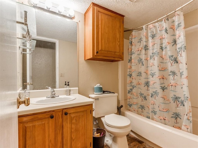 full bath featuring vanity, toilet, shower / bath combo, and a textured ceiling