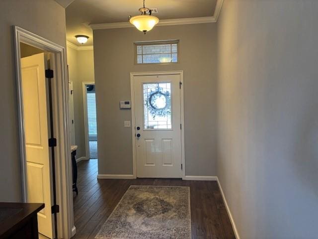 entrance foyer featuring baseboards, dark wood-style flooring, and ornamental molding
