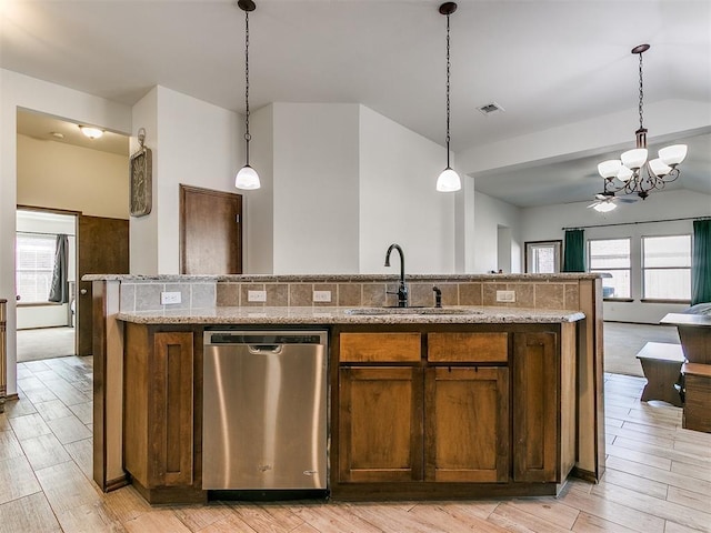 kitchen featuring visible vents, light wood-style flooring, open floor plan, dishwasher, and a chandelier