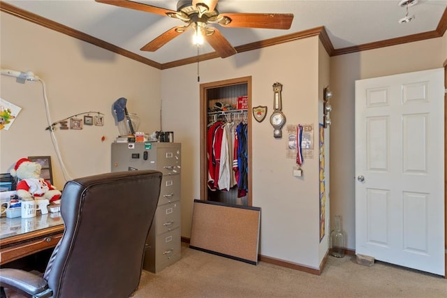 office with light colored carpet, crown molding, and a ceiling fan