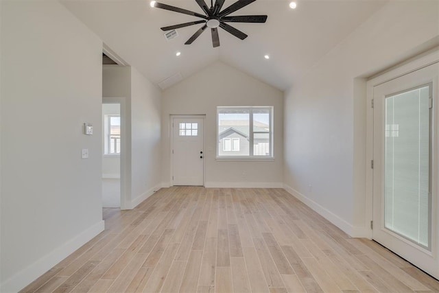 entrance foyer featuring light wood finished floors, visible vents, and plenty of natural light