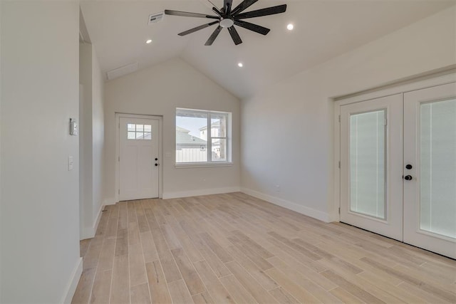 entryway with a ceiling fan, light wood-style floors, and french doors