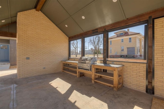 sunroom / solarium with lofted ceiling