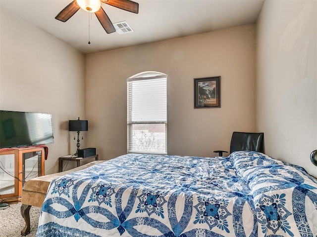 bedroom with a ceiling fan and visible vents