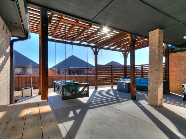 view of patio / terrace featuring outdoor lounge area, a fenced backyard, and a pergola