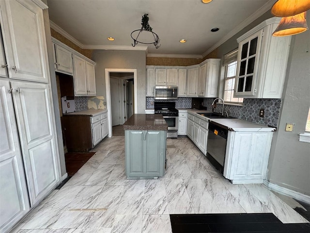 kitchen featuring marble finish floor, appliances with stainless steel finishes, a kitchen island, and a sink