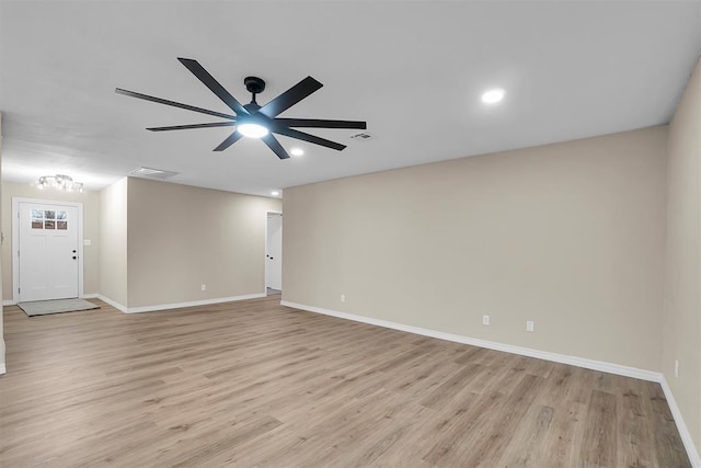 703 Comanche Trl, Altus, OK 73521 - unfurnished room featuring light wood-style floors, recessed lighting, and ceiling fan
