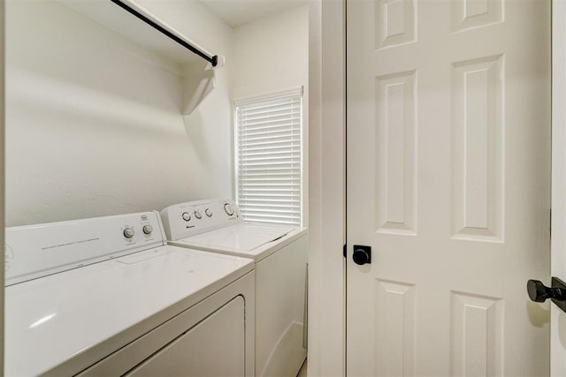 laundry area with washer and dryer and laundry area