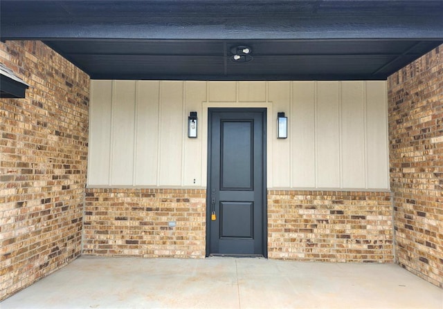 11613 NW 103rd St, Yukon, OK 73099 - view of exterior entry with brick siding