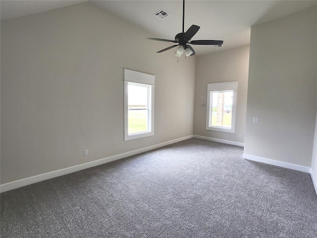 11613 NW 103rd St, Yukon, OK 73099 - unfurnished room featuring plenty of natural light, baseboards, carpet flooring, ceiling fan, and lofted ceiling