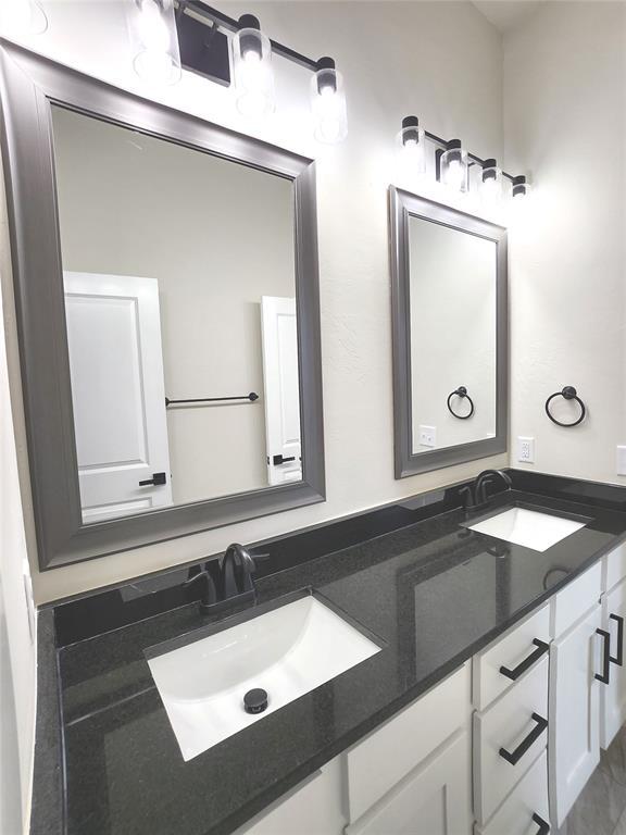 11613 NW 103rd St, Yukon, OK 73099 - bathroom featuring double vanity