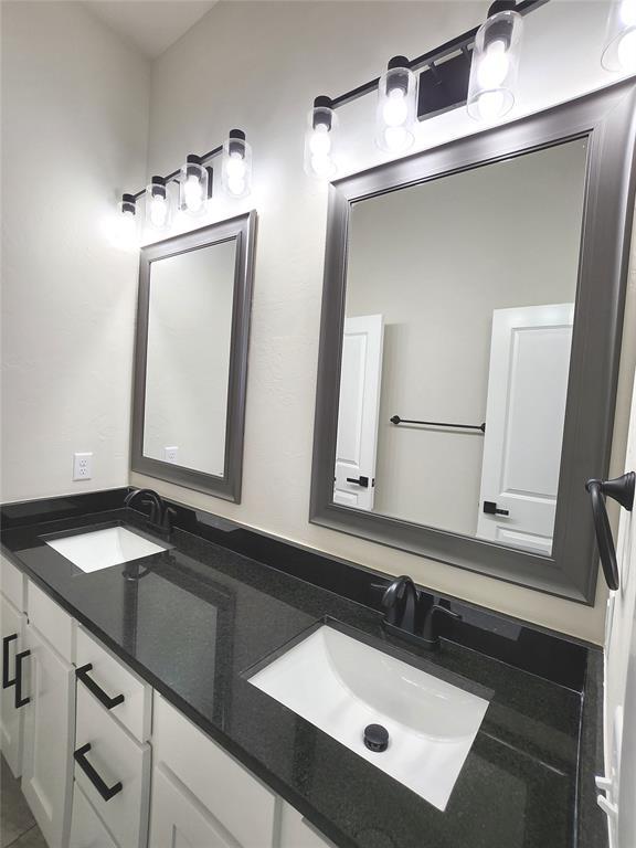 11613 NW 103rd St, Yukon, OK 73099 - bathroom featuring double vanity