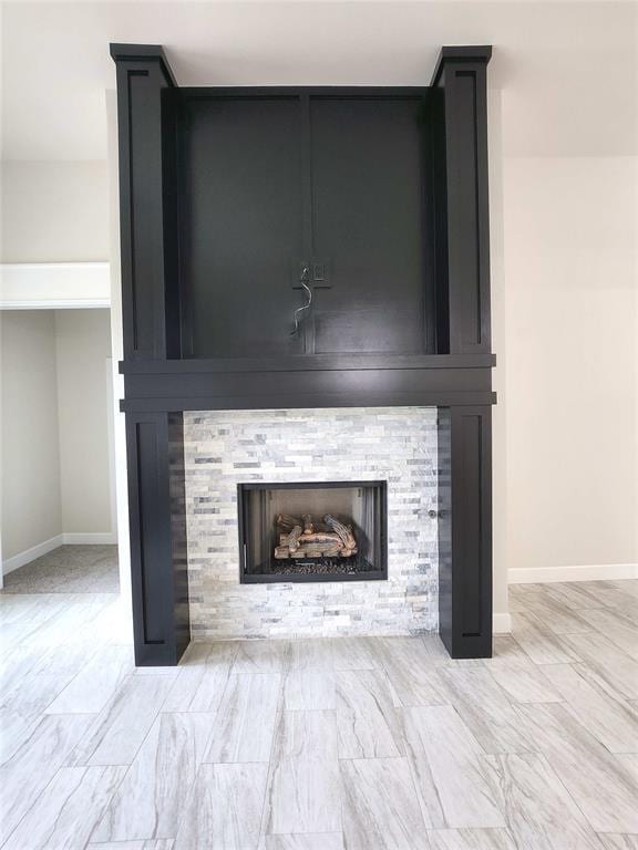 11609 NW 103rd St, Yukon, OK 73099 - detailed view of baseboards and a fireplace