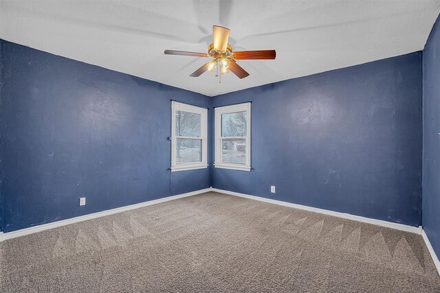 1724 N Lee St, Altus, OK 73521 - carpeted empty room with baseboards and a ceiling fan