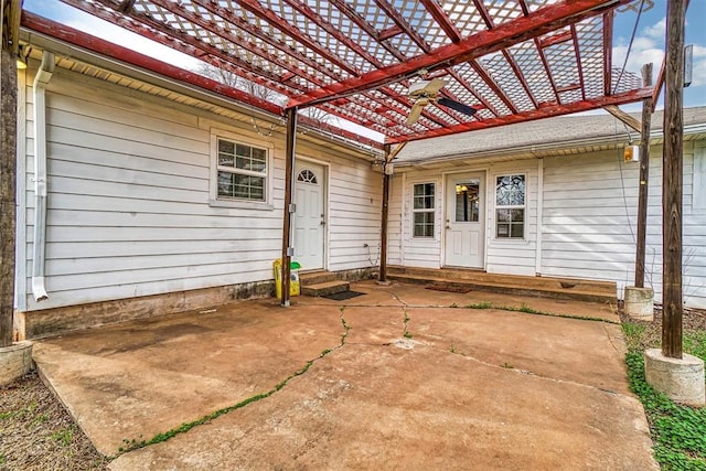 1724 N Lee St, Altus, OK 73521 - property entrance featuring a pergola and a patio area