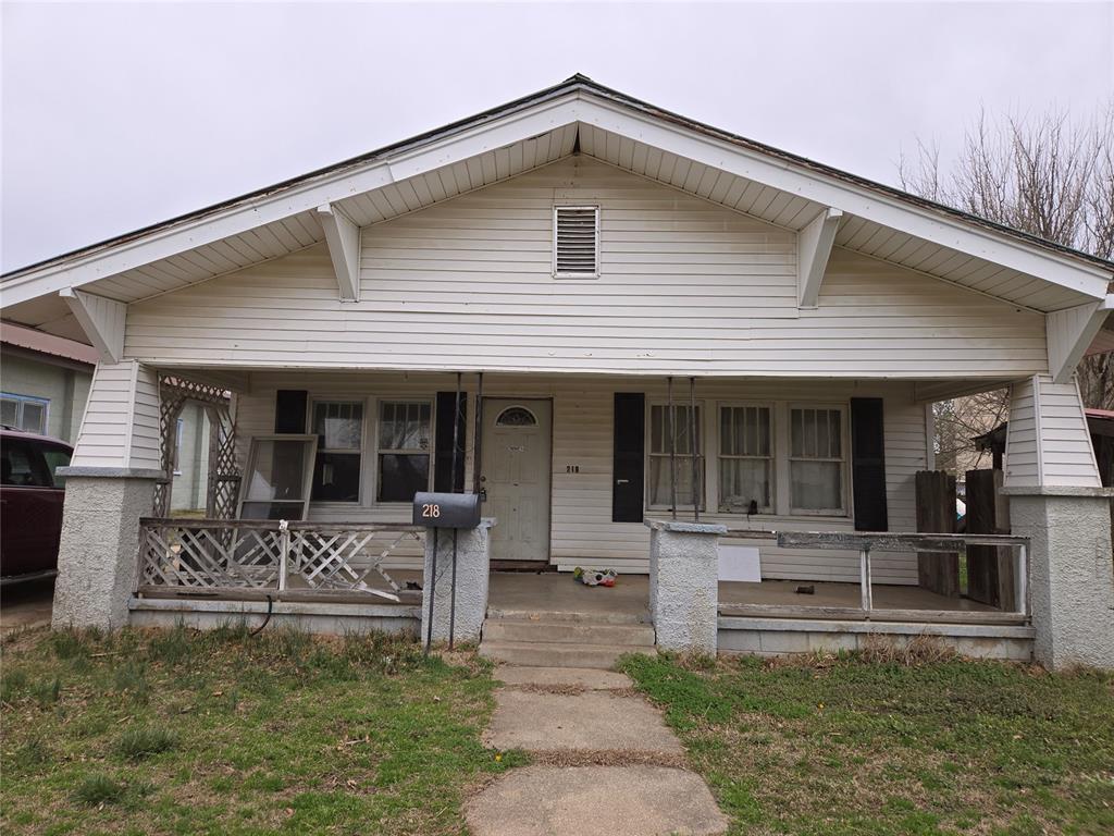 bungalow-style home featuring covered porch