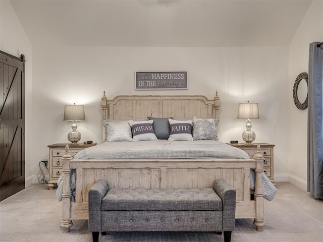 16304 Steppe Dr, Oklahoma City, OK 73170 - carpeted bedroom with a barn door and baseboards