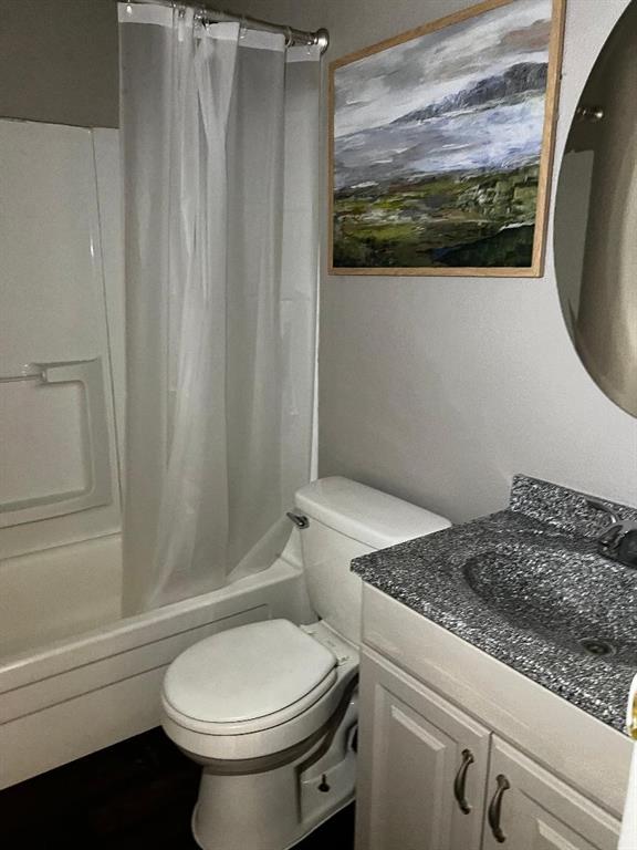 2513 N Nottingham Way, Moore, OK 73160 - bathroom with vanity, toilet, and shower / bath combo