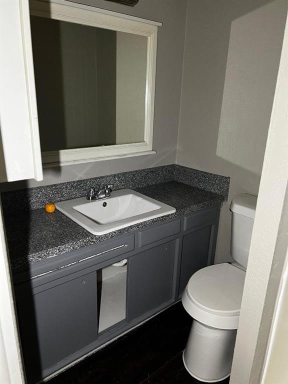2513 N Nottingham Way, Moore, OK 73160 - half bath featuring vanity and toilet