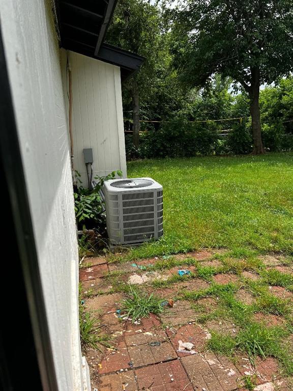 2513 N Nottingham Way, Moore, OK 73160 - exterior view of cooling unit