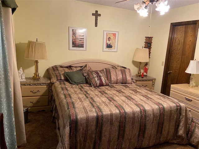 2416 SW 92nd St, Oklahoma City, OK 73159 - bedroom with carpet flooring, a ceiling fan, and a textured ceiling
