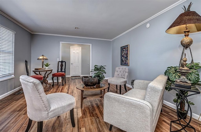 3316 NW 60th, Oklahoma City, OK 73112 - living area featuring wood finished floors, baseboards, and ornamental molding