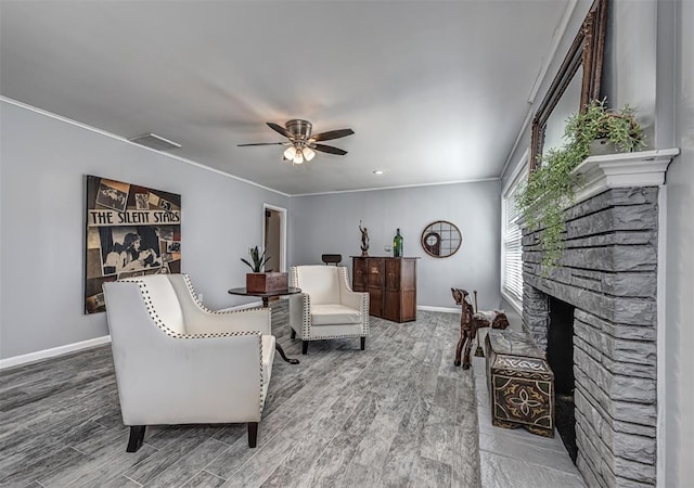 3316 NW 60th, Oklahoma City, OK 73112 - living room featuring a fireplace, wood finished floors, baseboards, and ceiling fan