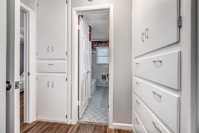 3316 NW 60th, Oklahoma City, OK 73112 - bathroom featuring wood finished floors and tile walls