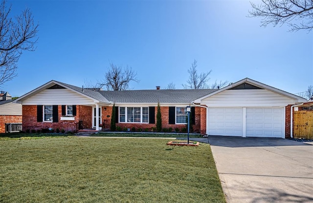 3316 NW 60th, Oklahoma City, OK 73112 - ranch-style house featuring an attached garage, brick siding, concrete driveway, and roof with shingles