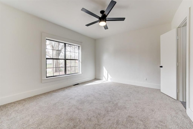 1721 NW 35th St, Oklahoma City, OK 73118 - carpeted spare room featuring visible vents, baseboards, and ceiling fan