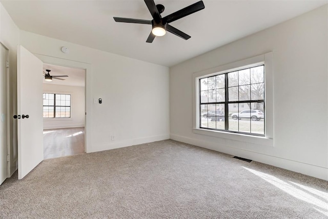 1721 NW 35th St, Oklahoma City, OK 73118 - carpeted spare room with visible vents and ceiling fan