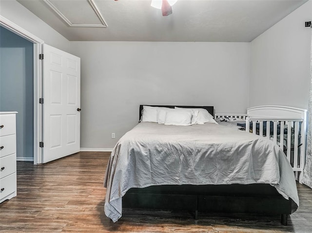 1415 NW 98th St, Oklahoma City, OK 73114 - bedroom featuring wood finished floors, baseboards, and ceiling fan