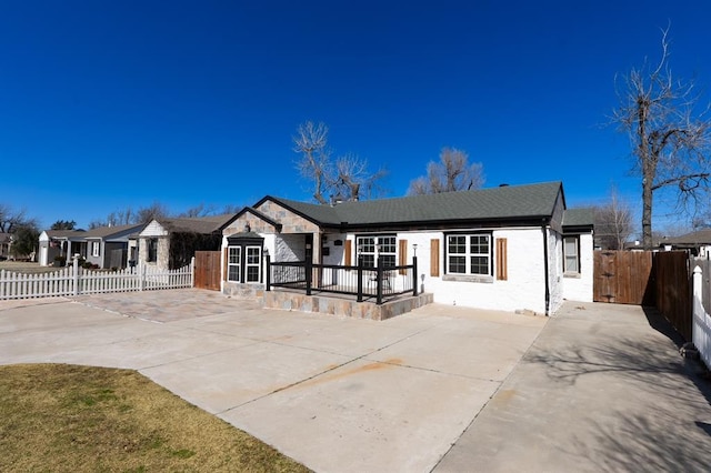 2935 NW Grand Blvd, Oklahoma City, OK 73116 - ranch-style house featuring a patio and fence