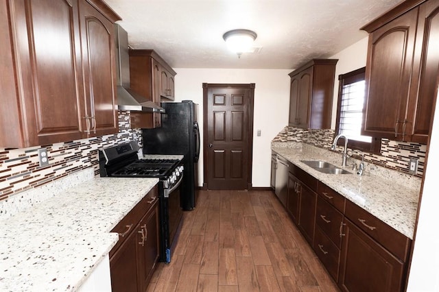 2935 NW Grand Blvd, Oklahoma City, OK 73116 - kitchen featuring a sink, backsplash, dark wood-style floors, stainless steel appliances, and light stone countertops