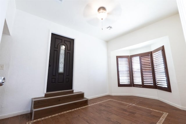 2935 NW Grand Blvd, Oklahoma City, OK 73116 - entryway with baseboards, wood finished floors, visible vents, and ceiling fan