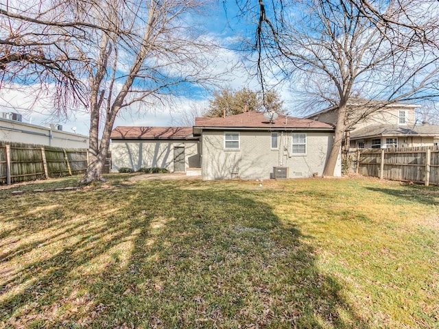 2832 Warwick Dr, Oklahoma City, OK 73116 - view of yard featuring central AC and a fenced backyard